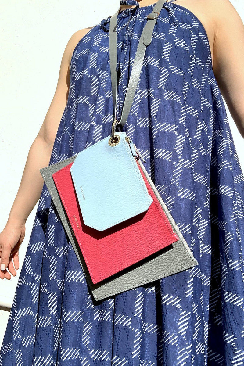Grey Fuchsia and Powder Blue Leather Pouches with Bracelet around the Neck